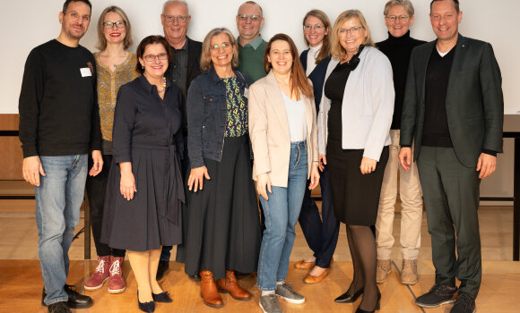 Gruppenbild mit 11 Personen